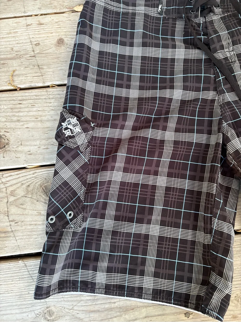 Quiksilver grail Black & Gray Plaid Board shorts.